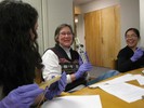 Photo of a student showing the class her Mickey Mouse slide rule.