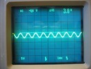 A partially blocked sine wave.