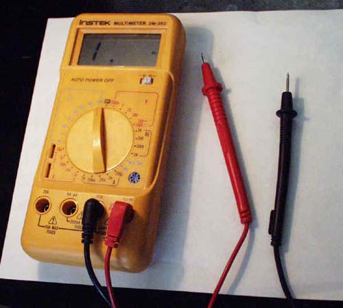 Yellow digital multimeter.